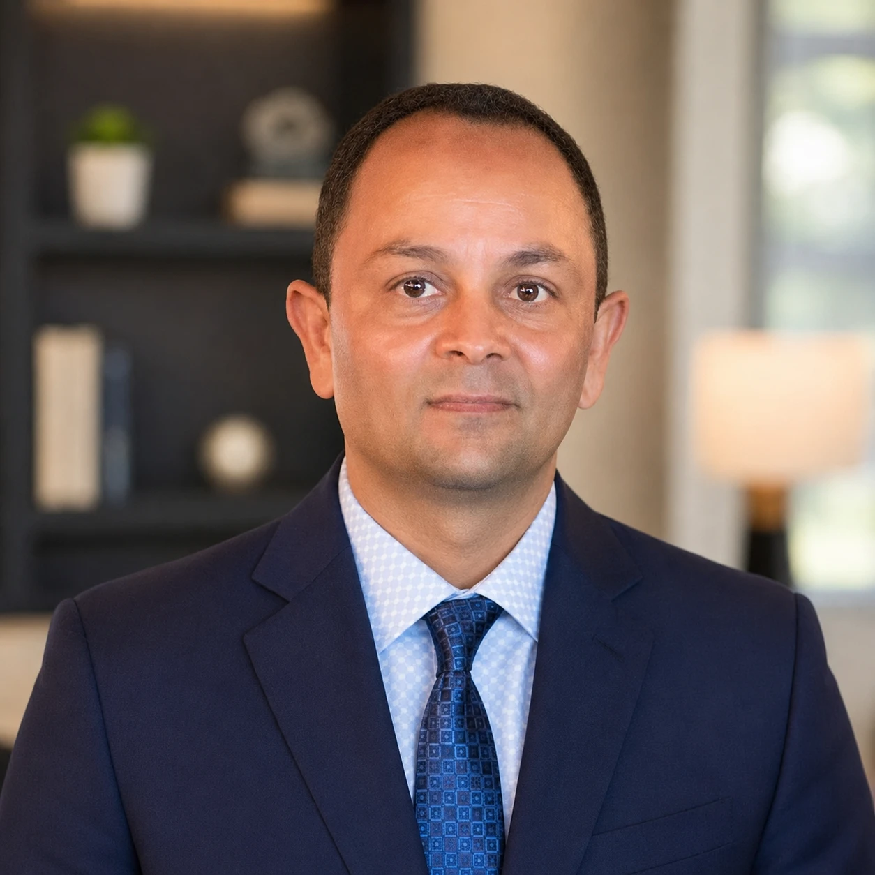 Headshot of Tapas Patel, multilingual REALTOR® at MaxxCity Realty across Florida's Space Coast